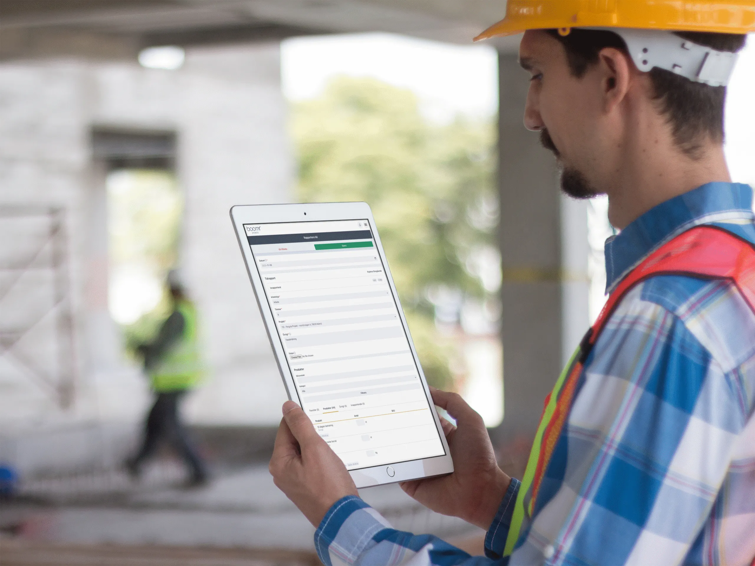 Mockup of a worker holding an ipad in portrait mode 12432